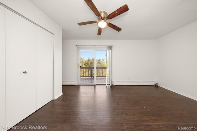 28290 Inkster Rd, Southfield, MI 48034 - unfurnished bedroom featuring access to outside, a baseboard heating unit, hardwood / wood-style flooring, and a closet