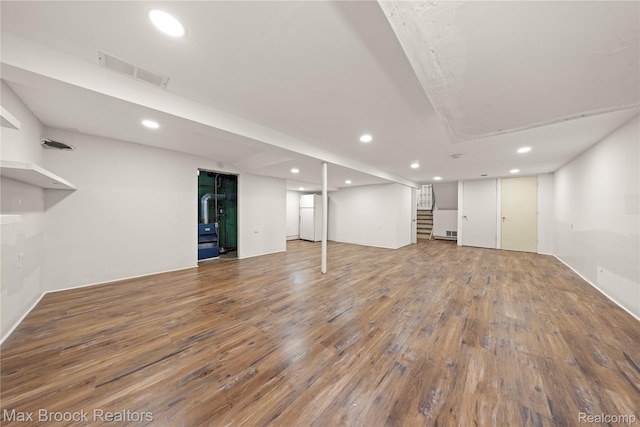28290 Inkster Rd, Southfield, MI 48034 - finished basement with recessed lighting, wood finished floors, and stairway