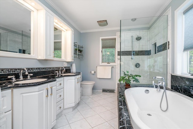 5400 Laura Dr, Shelbyville, MI 49344 - full bath with double vanity, a freestanding bath, a stall shower, ornamental molding, and toilet
