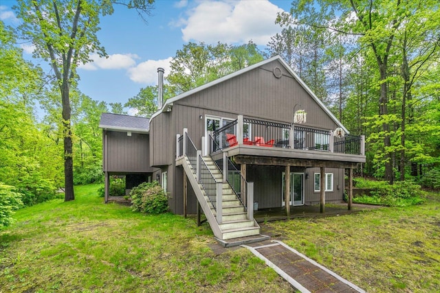 5400 Laura Dr, Shelbyville, MI 49344 - back of house featuring a wooden deck, a lawn, and stairs