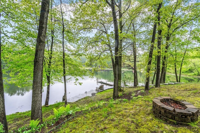 5400 Laura Dr, Shelbyville, MI 49344 - water view featuring an outdoor fire pit and a boat dock