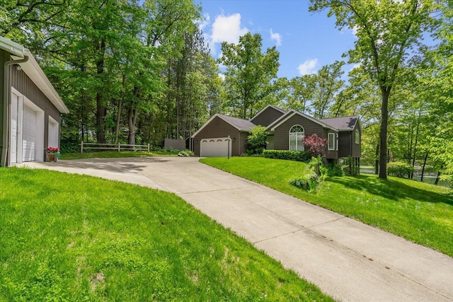 5400 Laura Dr, Shelbyville, MI 49344 - view of front facade with a front yard and concrete driveway