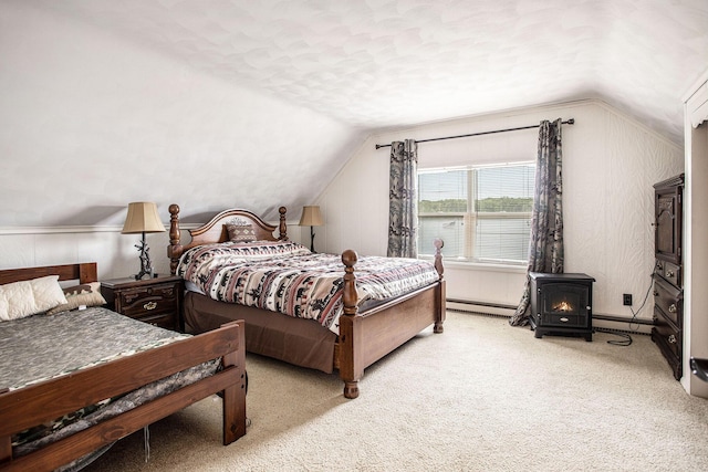 3050 Thorpe Dr, Delton, MI 49046 - carpeted bedroom featuring lofted ceiling, a wood stove, a baseboard radiator, and a textured ceiling