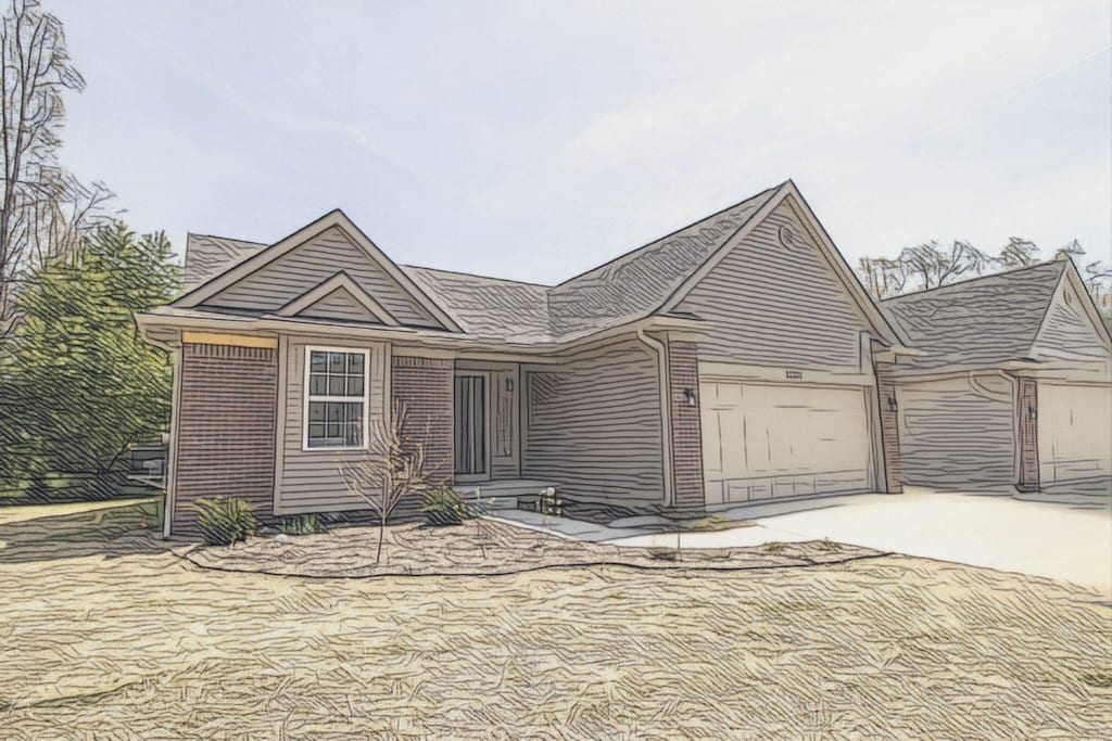 11410 Hidden Oaks Dr, Clio, MI 48420 - ranch-style home featuring concrete driveway, an attached garage, and brick siding