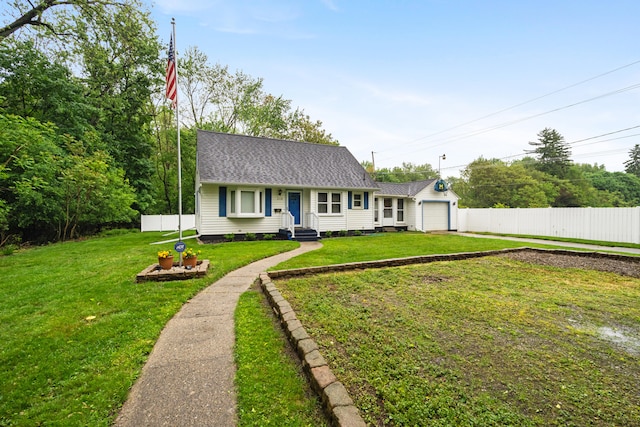 210 E Palmer Ave, Jackson, MI 49203 - view of front facade with driveway, roof with shingles, and a garage