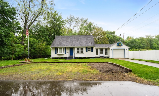 210 E Palmer Ave, Jackson, MI 49203 - view of front of property featuring an attached garage, driveway, and entry steps
