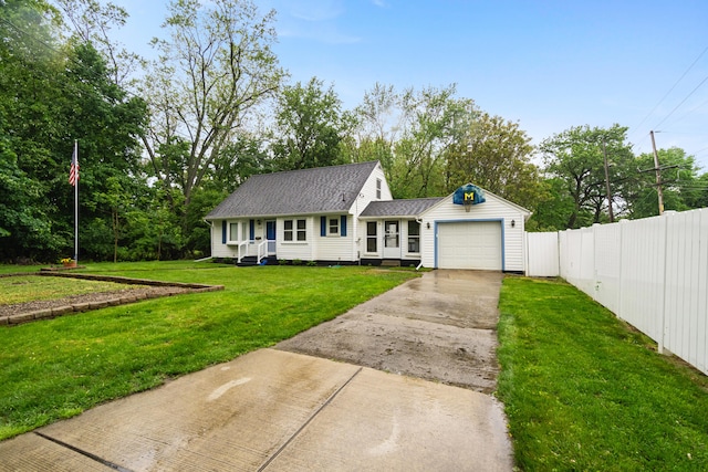 210 E Palmer Ave, Jackson, MI 49203 - view of front facade with an attached garage and concrete driveway