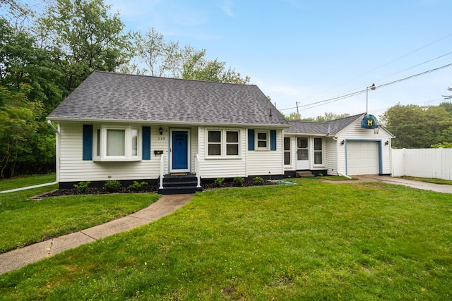 210 E Palmer Ave, Jackson, MI 49203 - view of front of home featuring driveway, a garage, roof with shingles, and entry steps