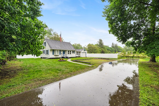 210 E Palmer Ave, Jackson, MI 49203 - view of front of property featuring a water view