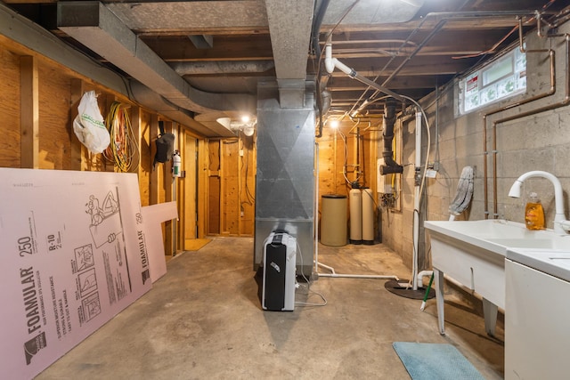 210 E Palmer Ave, Jackson, MI 49203 - below grade area featuring heating unit and a water softener system
