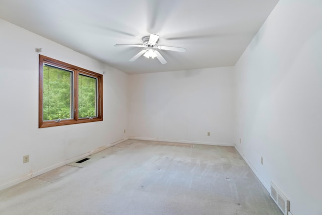 2141 N Parker Rd, Dexter, MI 48130 - unfurnished room with ceiling fan, light carpet, and baseboards