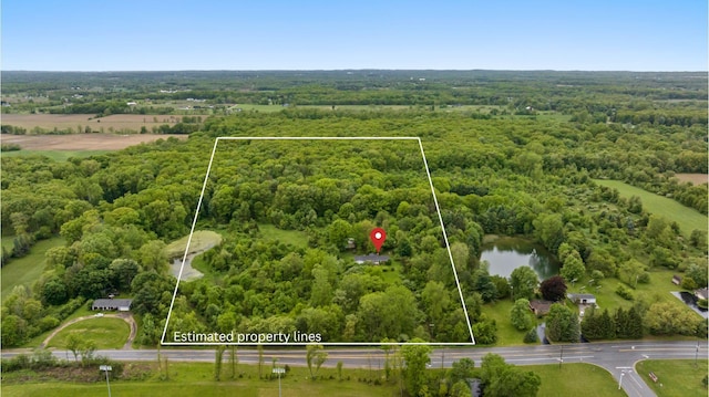 2141 N Parker Rd, Dexter, MI 48130 - view of property location featuring a forest, property parcel outlined, and a large body of water