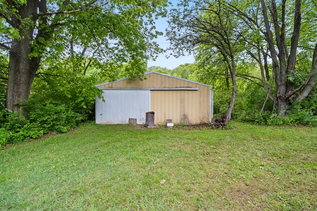 2141 N Parker Rd, Dexter, MI 48130 - view of grassy yard featuring an outbuilding and a garage