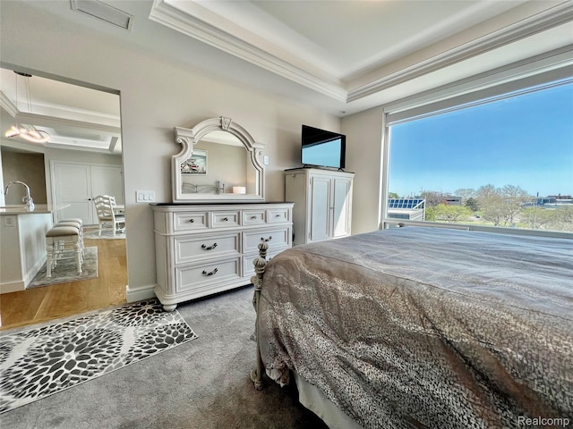 201 Beers St Unit 44, Port Huron, MI 48060 - carpeted bedroom with crown molding, a sink, and a raised ceiling