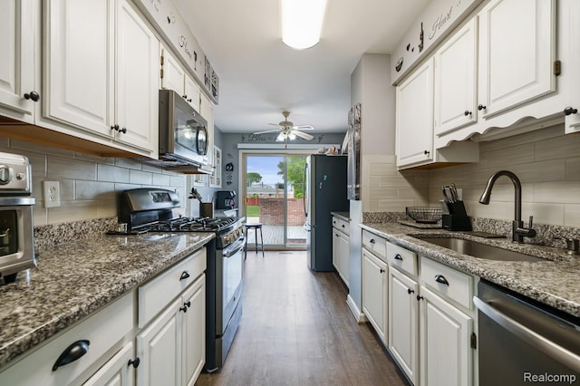 14850 La Grande Plz, Warren, MI 48088 - kitchen with appliances with stainless steel finishes, a sink, ceiling fan, and white cabinetry