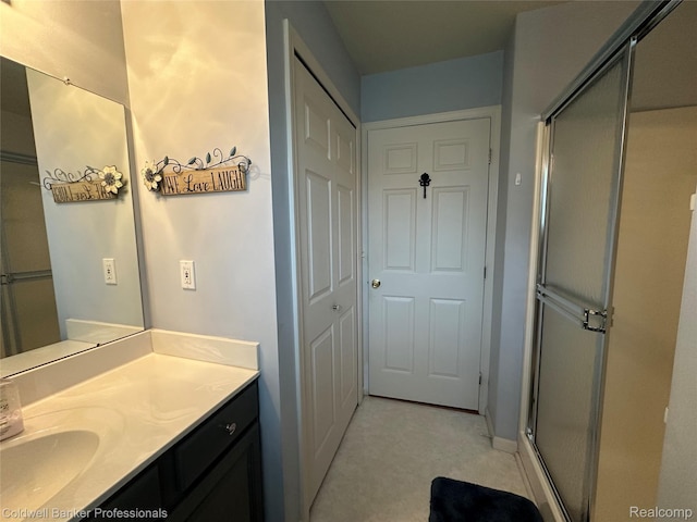 638 Eastway Cir, Lapeer, MI 48446 - bathroom featuring vanity and a stall shower