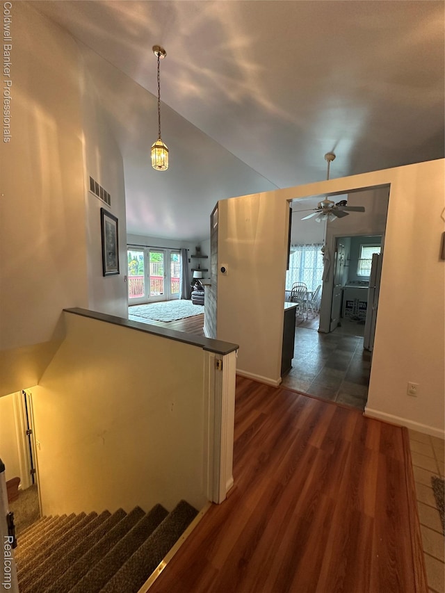638 Eastway Cir, Lapeer, MI 48446 - stairs featuring wood finished floors, a ceiling fan, baseboards, and lofted ceiling