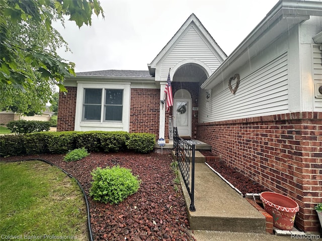 638 Eastway Cir, Lapeer, MI 48446 - entrance to property featuring brick siding