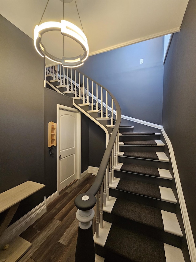 1010 6th St, Bay City, MI 48708 - stairs with wood finished floors and baseboards