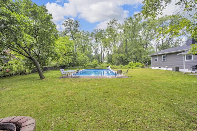 623 Pawnee St, Jackson, MI 49203 - view of yard featuring central AC unit and view of scattered trees