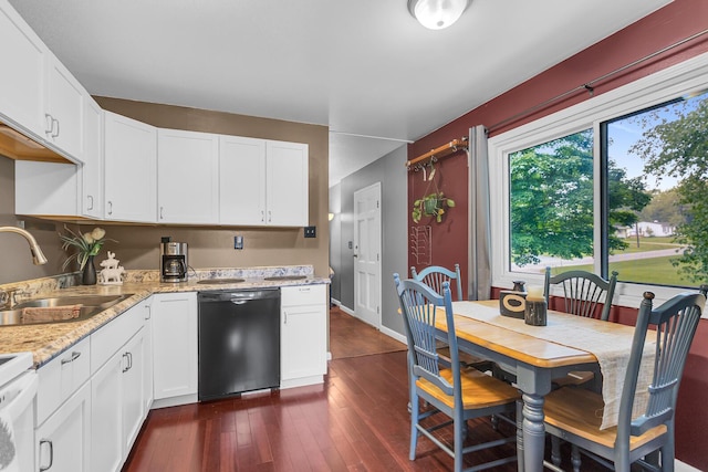623 Pawnee St, Jackson, MI 49203 - kitchen featuring dishwasher, a sink, dark wood-style flooring, and white cabinetry