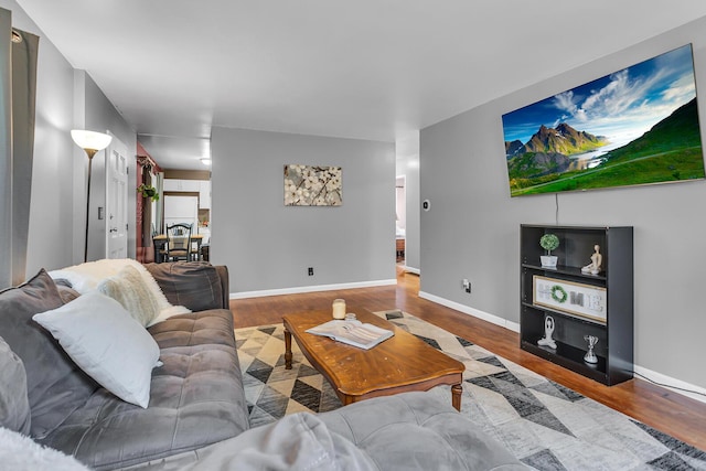 623 Pawnee St, Jackson, MI 49203 - living area with wood finished floors and baseboards