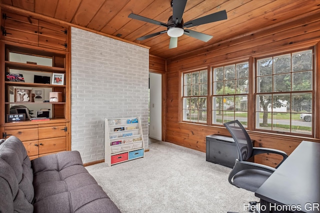 2052 Gorham Dr SE, East Grand Rapids, MI 49506 - home office with wood ceiling, a ceiling fan, wooden walls, carpet, and baseboards