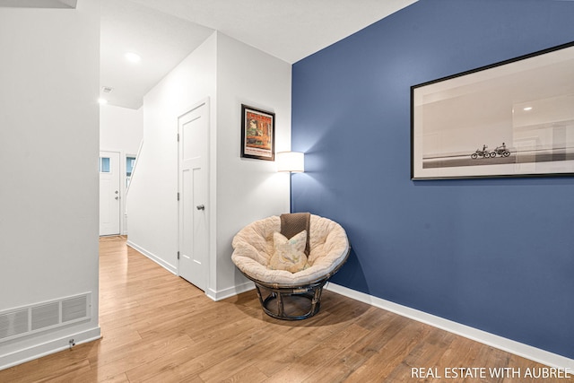 392 Harbor Town Ct Unit 2, Holland, MI 49423 - living area with wood finished floors and baseboards
