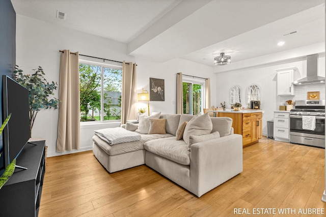 392 Harbor Town Ct Unit 2, Holland, MI 49423 - living area featuring light wood-style floors and recessed lighting