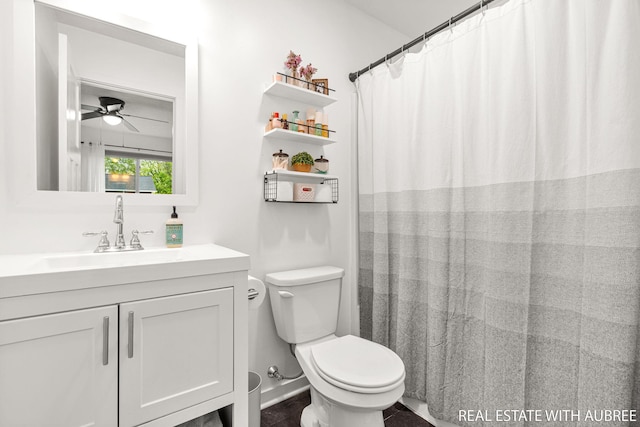 392 Harbor Town Ct Unit 2, Holland, MI 49423 - bathroom featuring a ceiling fan, toilet, and vanity