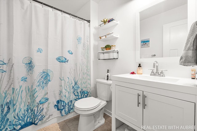 392 Harbor Town Ct Unit 2, Holland, MI 49423 - bathroom with toilet, vanity, curtained shower, and tile patterned flooring