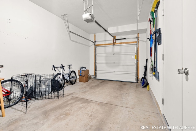 392 Harbor Town Ct Unit 2, Holland, MI 49423 - garage featuring a garage door opener