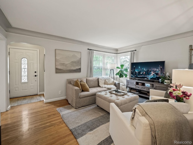 1017 N Connecticut Ave, Royal Oak, MI 48067 - living room with wood finished floors, arched walkways, and baseboards