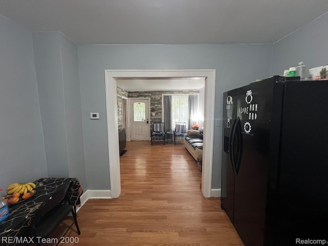 6101 Auburn St, Detroit, MI 48228 - hallway with light wood-type flooring and baseboards