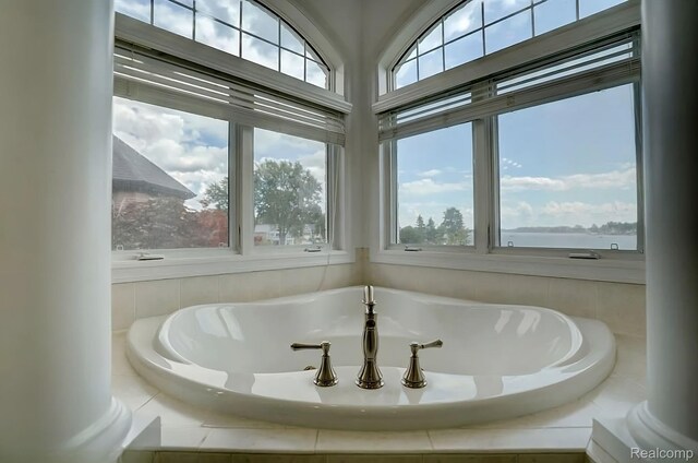 2571 N Long Lake Rd, Fenton, MI 48430 - full bath featuring a bath and a water view