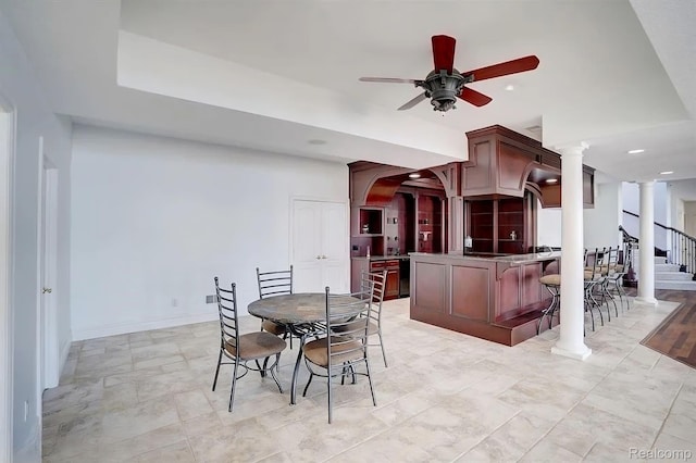 2571 N Long Lake Rd, Fenton, MI 48430 - dining room featuring ornate columns, a ceiling fan, recessed lighting, arched walkways, and stairway