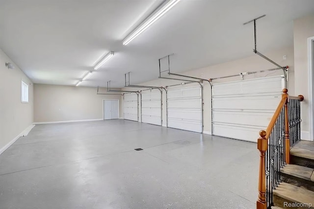 2571 N Long Lake Rd, Fenton, MI 48430 - garage featuring baseboards