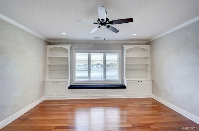 2571 N Long Lake Rd, Fenton, MI 48430 - unfurnished living room with light wood-style floors, ornamental molding, a ceiling fan, baseboards, and recessed lighting