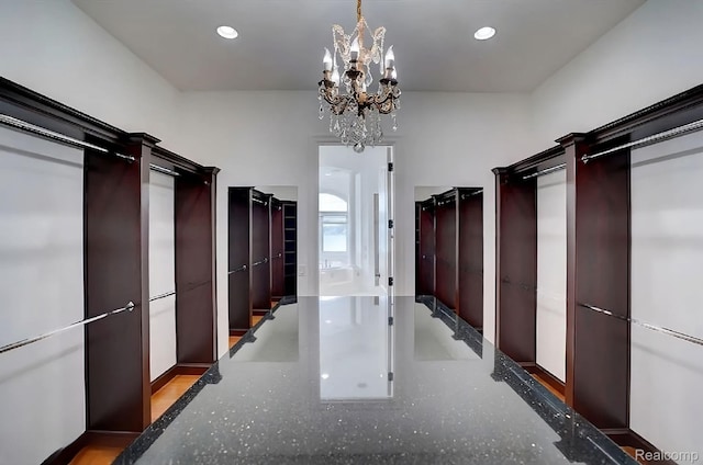 2571 N Long Lake Rd, Fenton, MI 48430 - spacious closet with a chandelier and a barn door