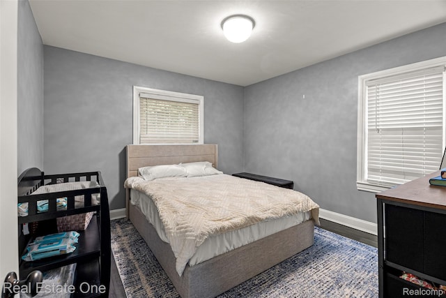 15237 Oceana Ave, Allen Park, MI 48101 - bedroom with baseboards and dark wood-style flooring