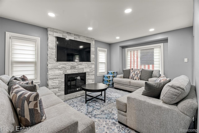 15237 Oceana Ave, Allen Park, MI 48101 - living area featuring recessed lighting, a fireplace, and wood finished floors