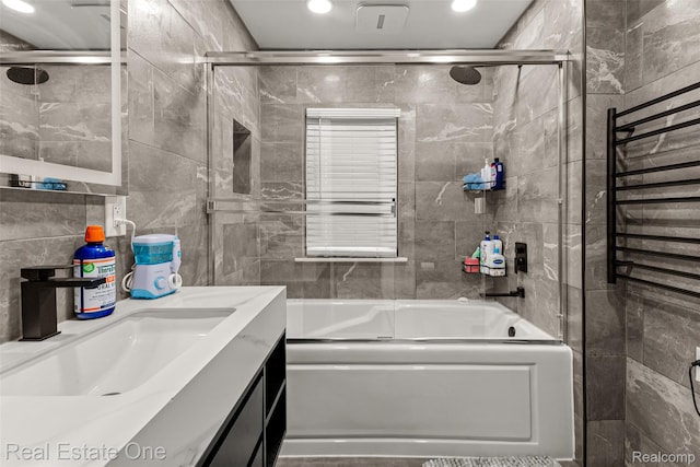 15237 Oceana Ave, Allen Park, MI 48101 - bathroom with tile walls, vanity, combined bath / shower with glass door, and recessed lighting