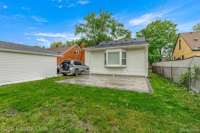 15237 Oceana Ave, Allen Park, MI 48101 - rear view of house with a patio area