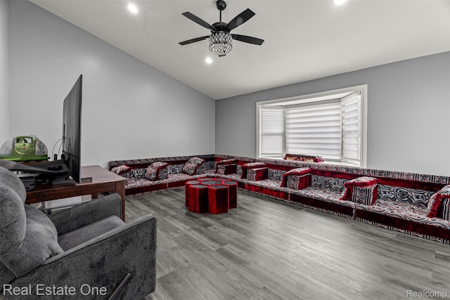 15237 Oceana Ave, Allen Park, MI 48101 - living area with lofted ceiling, ceiling fan, recessed lighting, and wood finished floors