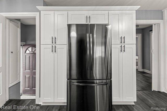 15237 Oceana Ave, Allen Park, MI 48101 - kitchen featuring freestanding refrigerator, dark wood-style floors, white cabinets, and baseboards