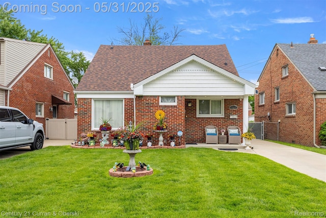 15210 Russell Ave, Allen Park, MI 48101 - bungalow-style house featuring a gate, brick siding, a shingled roof, and a chimney