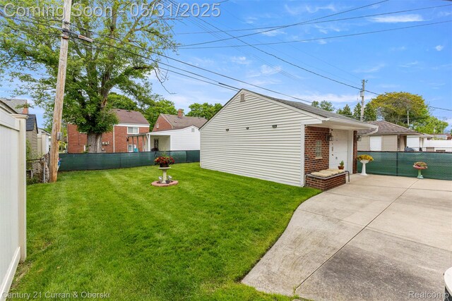 15210 Russell Ave, Allen Park, MI 48101 - view of yard with a patio, a garage, and an outbuilding