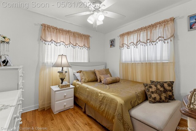 15210 Russell Ave, Allen Park, MI 48101 - bedroom with multiple windows, light wood-type flooring, and a ceiling fan