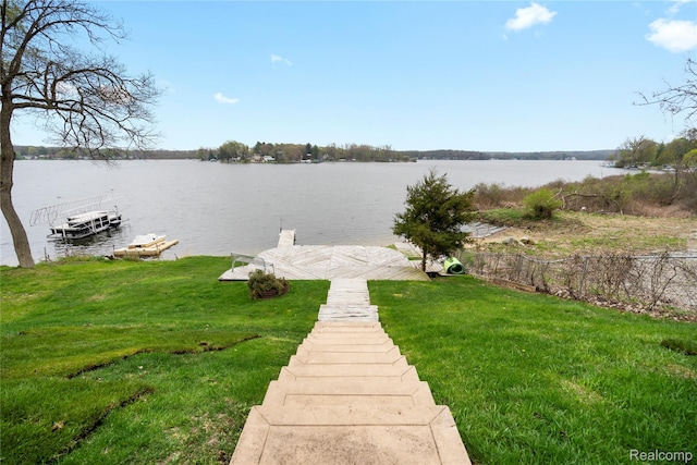 11589 Ember, Davisburg, MI 48350 - dock with a water view and a lawn