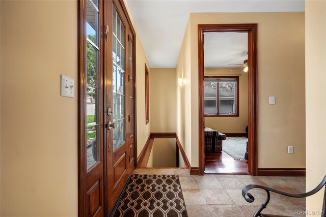 11589 Ember, Davisburg, MI 48350 - entrance foyer featuring baseboards, french doors, and ceiling fan